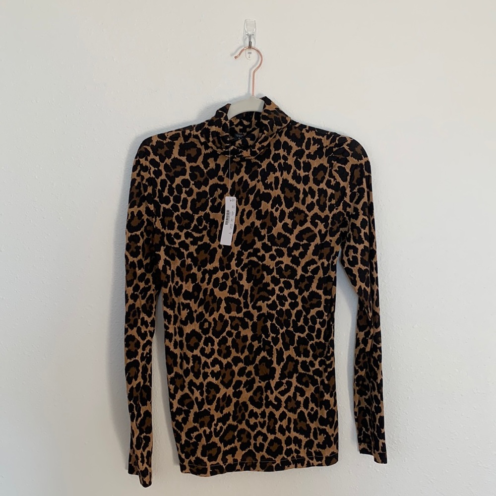 J Crew tissue turtleneck size small. New with tags.